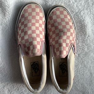 A pair of pink Vans.